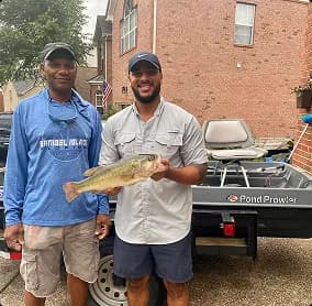 Joe and Jerry with their boat and Sidekick products